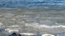 Awesome waves of ice crashing against the shores of Lake Superior