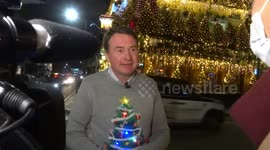 James Keogh of The Churchill Arms speaks on pine trees decorating the famous pub at Christmas Lights switch on ceremony
