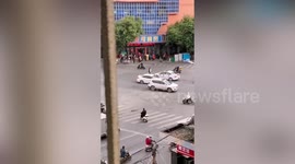 Chinese woman blocks alleged ex-boyfriend's wedding car in attempt to 'change his mind'