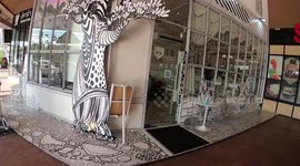 Head-spinning cafe is decorated entirely with black and white 2D furnishings