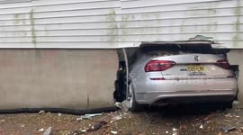 Vehicle smashes into New Jersey basement, leaving driver badly hurt