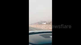 US: Orange County, CA Sky Filled With Smoke Due To Bond Fire