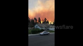 ‘Bond Fire’ plume turns Orange County skies orange