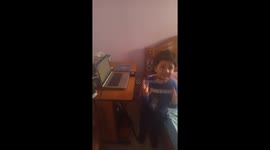 Kid dancing to a rhyme and enjoying
