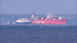 Cruise ship CMV Astoria being towed away after several months lay up in Kent, UK