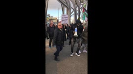 StandupX protesters singing and dancing outside Stratford Centre in London