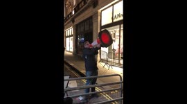 Angry man shouts through a traffic cone about coronavirus in retaliation to Canada Goose anti-fur protesters