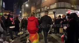 Large crowd joins street party in central London on first Saturday night since end of 2nd UK lockdown