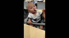 8 Months Old Baby, Tasting Ice Cream for the First Time. addictive