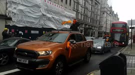 Hundreds of Sikhs gridlock central London in protest against India's farming reforms