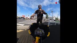 Japanese eco-warrior picks up litter while speeding around on his scooter