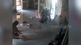 Thai mother's quick reaction stops venomous centipede from biting baby son