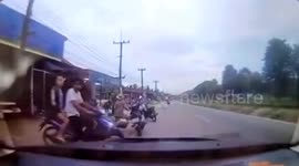 Pregnant motorcycle passenger dodges loose wheel hurtling towards her HEAD