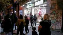 People form lines out of Christmas retail stores to buy trees and decorations - Xmas shopping during lockdown 2.0
