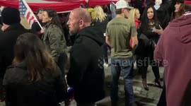 Maskless Trump supporters gather in close quarters to rally against California's latest COVID lockdown
