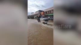 Flooded roads lead to carnival-like ride in Thailand