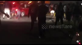 Garbage truck on fire, light poles falling down during Jacob Blake protest in Kenosha