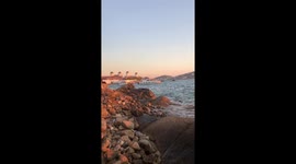 Summer Sunset on the Ocean in Mykonos, Greece.