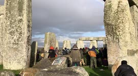 Protesters take part in 'mass trespass' at Stonehenge to oppose plans to dig tunnel