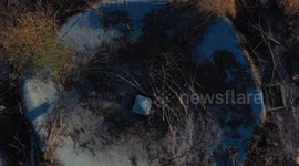 Aerial view of a pool, swimming pool and spa in deterioration due to being abandoned and burned, located in the rural area of Real del Alamito in Sonora, Mexico