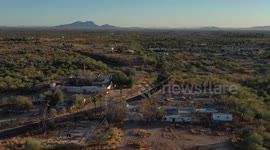 Aerial view of a pool, swimming pool and spa in deterioration due to being abandoned and burned, located in the rural area of Real del Alamito in Sonora, Mexico