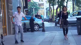 Selfie-taking man startles people on streets in prank