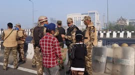 Farmers call a nationwide strike over three farm laws in Delhi, India and block a highway