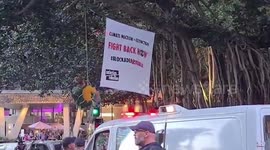 Australia: Climate Change Protesters Block Traffic In Downtown Brisbane