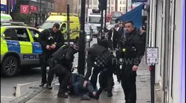 Armed police take down man suspected of robbing London charity shop at gunpoint