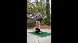 California man maintains balance while swinging ropes on muscle rollers