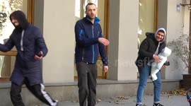 Practical joker tricks pedestrians with fake baby prank