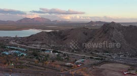 View of the Abelardo L. Rodriguez dam, cerro de la cementera and La Sauceda recreational park that is in deterioration due to abandonment on December 11, 2020 in Hermosillo, Mexico.