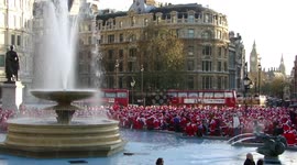 ARCHIVE: Thousands of Santa Clauses arrived to Trafalgar Square to celebrate Christmas at SantaCon flashmob, London, UK