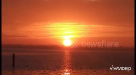 Puesta de sol desde un muelle