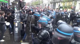 Scores arrested as demonstrators clash with police in Paris security law protest