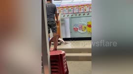 Man Tries To Weigh Giant Fish On Shop's Digital Scales