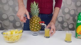 This is how you make your very own juice dispenser from a pineapple