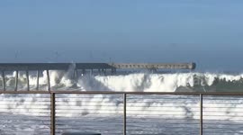 Massive California king tide waves crash over San Mateo County pier