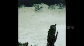 Massive, thick sea foam covers Australia beaches