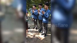 Three Thai men get married in Buddhist wedding ceremony