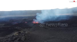 Drone footage reveals lava spurting out volcanic crack on Reunion Island
