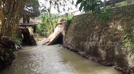 Bridge Collapses During Floods In Indonesia