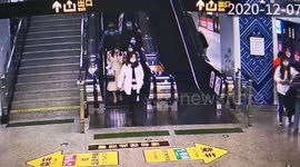 Escalator at Chinese train station forced to stop as woman's heel gets trapped
