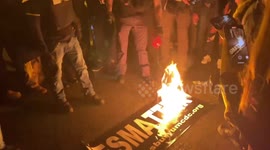 Proud Boys burn Black Lives Matter banner in DC
