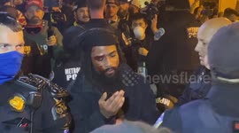 Stabbing suspect has bloodied face after confrontation with Proud Boys