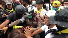 Thai protesters scuffle with police following arrests of activists
