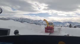 Armed forces clean up heavy snow on Japanese highway to free 1,000 people stranded overnight