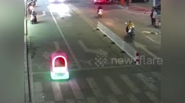 Woman stopped by police after driving toy car covered in neon lights on road in China