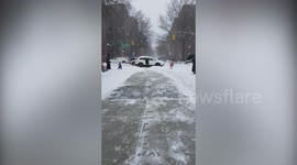 Kids make the best of New York snow as they play through cold weather