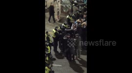 Travelers faced with police as they attend a wake despite COVID-19 restrictions